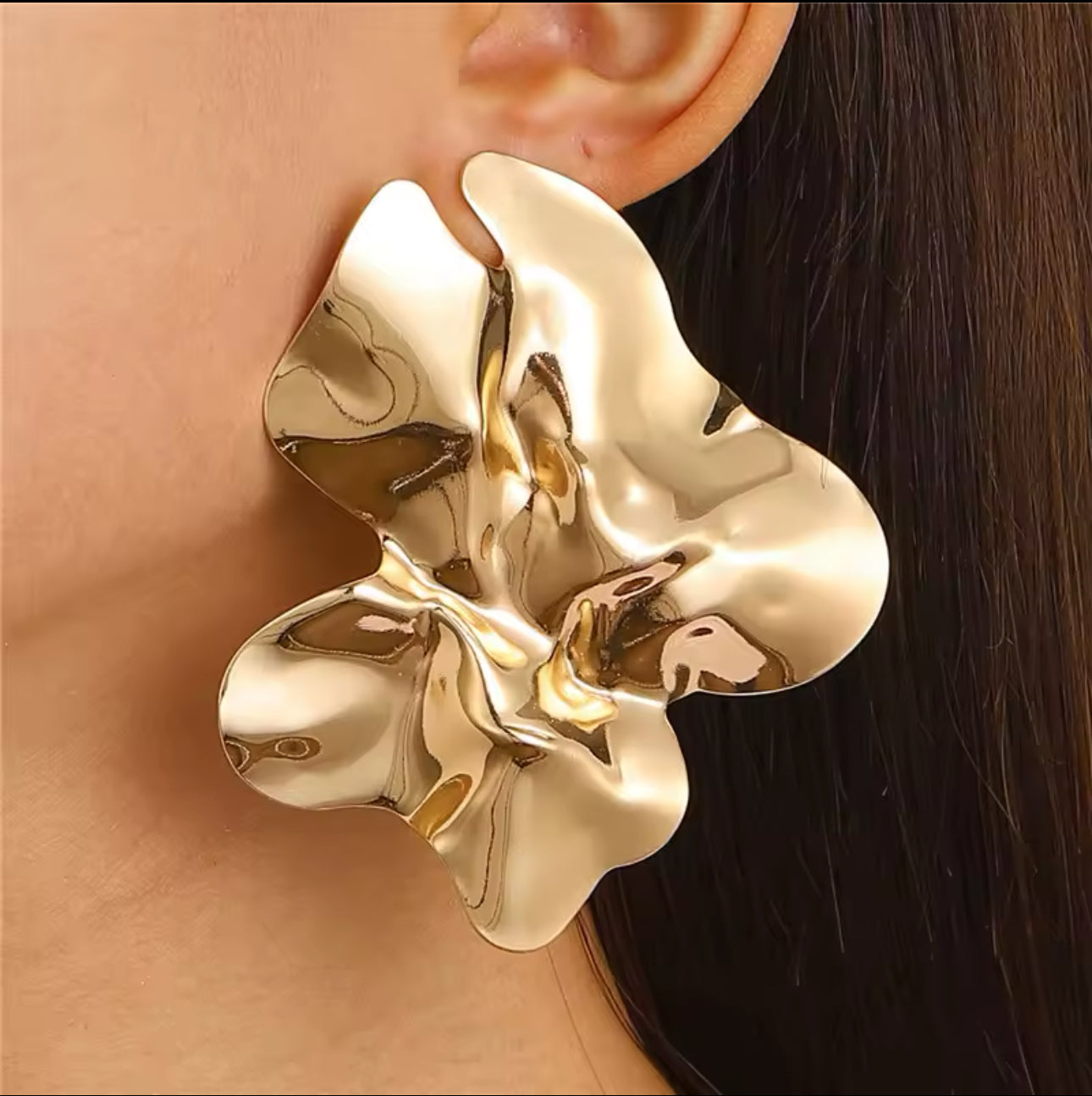 Gold statement earring