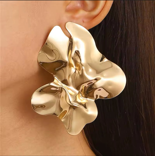 Gold statement earring